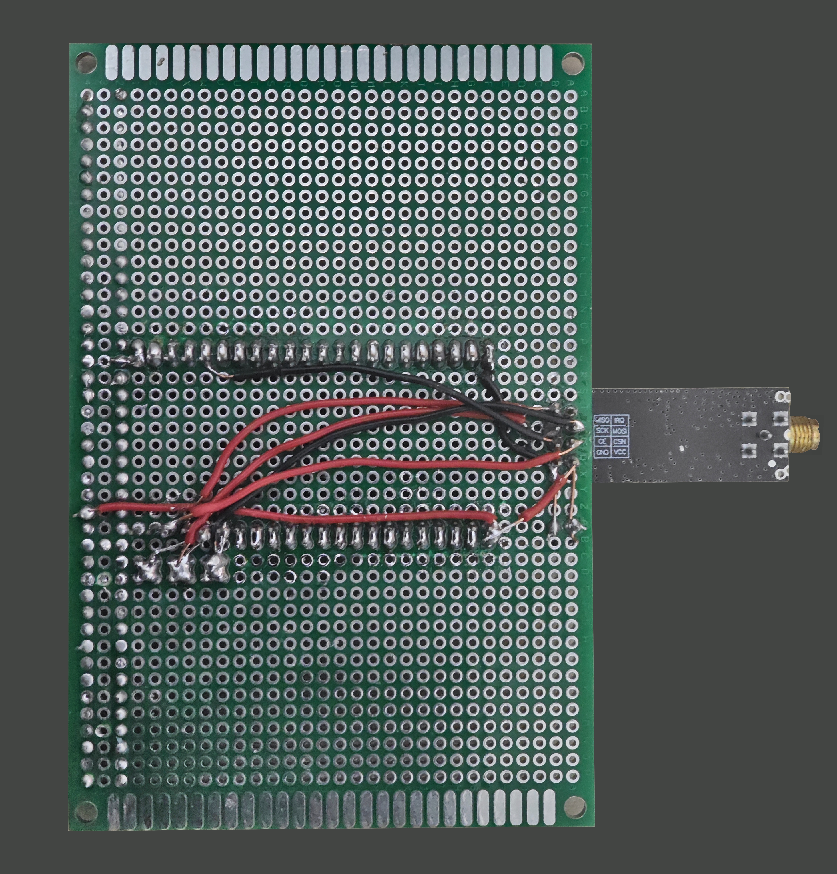 Bottom solder-side point-to-point wiring of the Rev 0.1 perfboard carrier